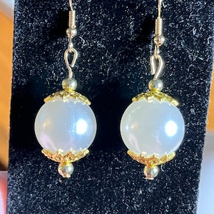 Pearl and gold earrings