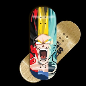 May include: A fingerboard featuring a colorful graphic of a character with a screaming expression. The design incorporates red, black, yellow, and blue hues. A second gold-colored fingerboard is visible in the background.