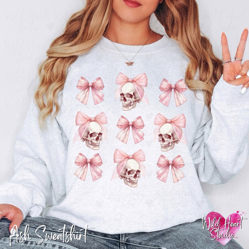 Dark Coquette Skull with Bow Crewneck Sweatshirt Pink Preppy Halloween Coquette Hoodie Soft Gothic Clothes Balletcore Aesthetic Pastel Goth Sweater Plus Size Halloween Kids Emo Valentine Skull Hoodie Trendy Spooky Season Outfit Wild Heart Studio TX