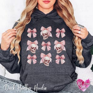 Dark Coquette Skull with Bow Crewneck Sweatshirt Pink Preppy Halloween Coquette Hoodie Soft Gothic Clothes Balletcore Aesthetic Pastel Goth Sweater Plus Size Halloween Kids Emo Valentine Skull Hoodie Trendy Spooky Season Outfit Wild Heart Studio TX