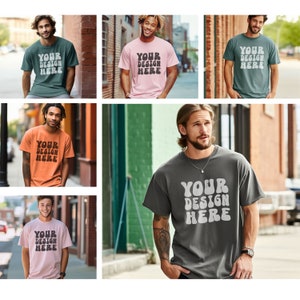 May include: Five different men's t-shirts with the text "YOUR DESIGN HERE" in a retro font. The shirts are in various colors, including green, pink, orange, gray, and light pink.