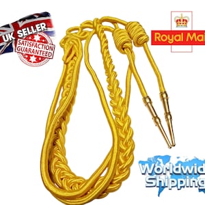 May include: A gold braided cord with two gold metal tips. The cord is used for ceremonial purposes.