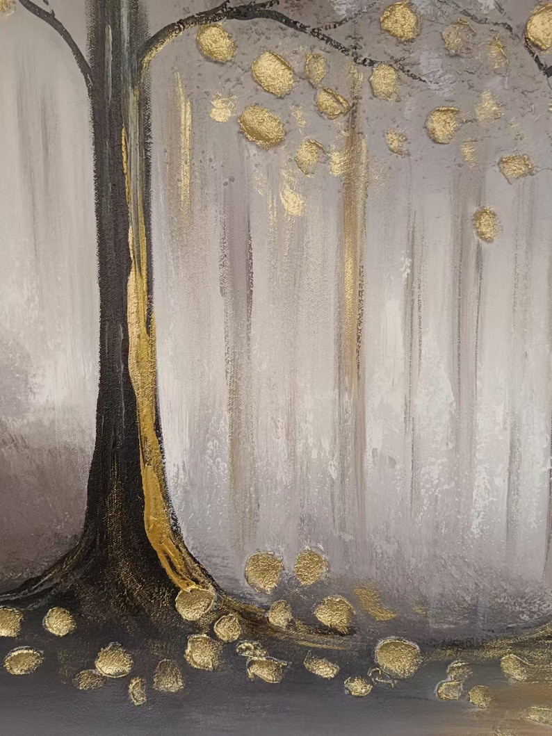 May include: A textured painting featuring a dark brown tree trunk with a vertical gold accent line. The background consists of vertical gray and white brushstrokes. Gold metallic circular shapes represent leaves on the branches and scattered on the ground.