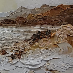 May include: An oil painting on canvas featuring a coastal landscape with thick impasto brushstrokes. The scene depicts white crashing waves against rocky brown cliffs under a pale sky. The texture is highly raised, creating a tactile surface.