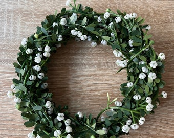 Boxwood garland decoration for confirmation communion or baptism