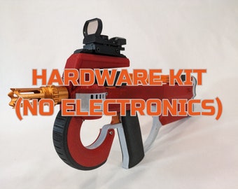 May include: A red and gold hardware kit (no electronics) with a black sight and a curved handle. The text "HARDWARE KIT (NO ELECTRONICS)" is displayed in orange. The kit has a futuristic design.