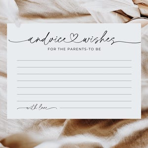May include: A white card with the words "advice & wishes" in elegant script, with a heart symbol between the words. The text "FOR THE PARENTS-TO-BE" is below, and "with love" at the bottom. Horizontal lines fill the card.