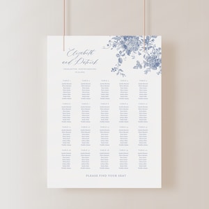 May include: A blue and white floral wedding seating chart with the names "Elizabeth and Patrick" and the date "28.04.2023". The chart lists tables 1 through 20 with guest names assigned to each table.