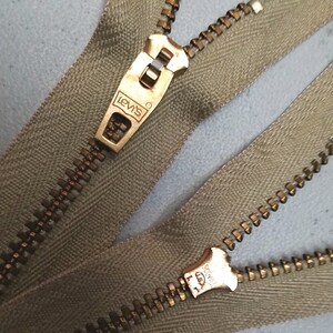 Do older Louis Vuitton bags use Scovill Gripper zippers? Not sure