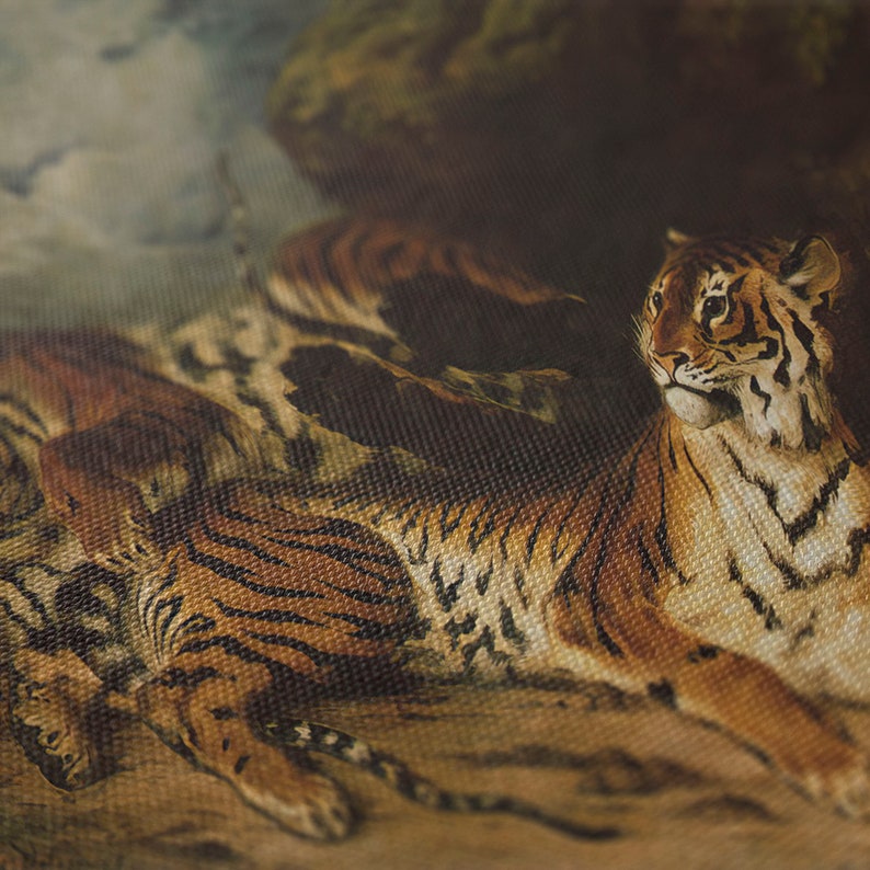 May include: Close-up of a fabric featuring a detailed painting of tigers. The tigers have orange and black stripes, with a realistic depiction of their fur and facial features. The background suggests a natural environment.