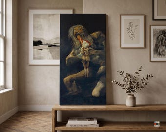 May include: A rectangular canvas print featuring a dark, somber painting of a wide-eyed, disheveled figure with long gray hair, hunched over and consuming a smaller, pale figure against a deep black background, rendered in muted earth tones.