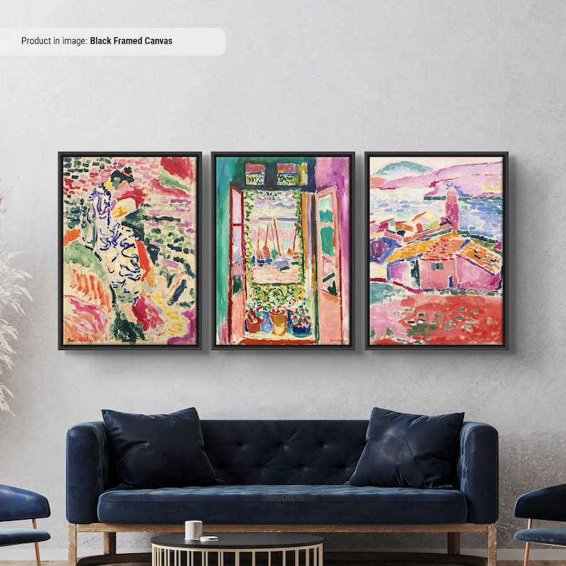 May include: A three-piece set of framed canvas prints featuring abstract paintings in vibrant colors. The paintings depict a woman in a landscape, a window with a view of a harbor, and a pink house with a red roof.