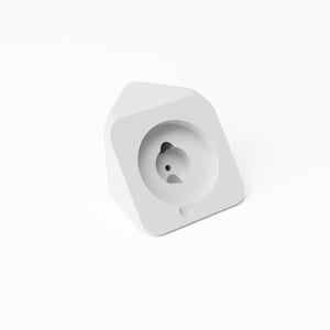 Pode incluir: Um objeto branco de forma geométrica com uma reentrância circular. O objeto tem uma pequena protuberância arredondada em um lado e um topo plano. O design é minimalista e moderno, com linhas limpas e uma superfície lisa.