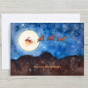 Bonita tarjeta navideña / Tarjeta navideña de Papá Noel / Tarjeta de acuarela hecha a mano / Arte de Nueva Zelanda / Papel ecológico / Sobre reciclado / Queenstown, Nueva Zelanda