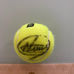 Novak Djokovic Autographed Tennis Ball with Proof Photo and Coa