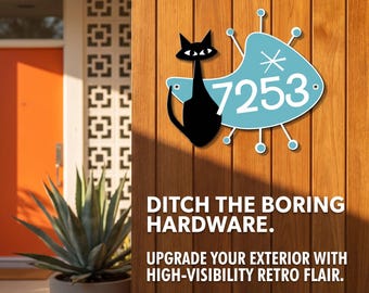 May include: A house number plaque featuring the number 7253 in white on a light blue amoeba-shaped background with a black cat silhouette. The design includes white starburst accents and thin radiating lines with small blue circles at the ends.