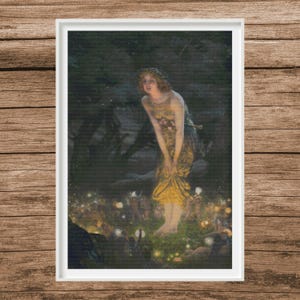 May include: A framed print of a vintage painting depicting a woman in a golden dress standing in a forest clearing. The woman is surrounded by glowing lights and figures, with a dark, mysterious background.