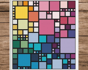May include: A framed abstract cross-stitch pattern featuring a geometric design. The artwork is composed of various squares in shades of yellow, orange, green, blue, purple, and pink, outlined in black. The piece is mounted in a white frame.