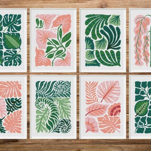 May include: Set of eight printable wall art prints featuring abstract botanical illustrations in shades of green and pink. The prints feature various leaf and flower designs.