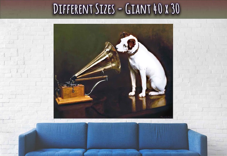 May include: A white dog with brown ears sits listening to a vintage gramophone with a large, golden horn. The dog is looking intently at the horn. The gramophone is on a wooden table with a dark brown surface. The background is a dark green color.