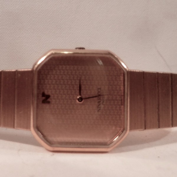 Rare Montre bracelet Nina Ricci plaquée or, numérotée