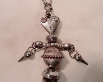 Metal puppet pendant