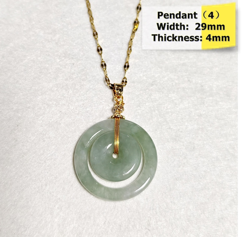 May include: A gold-colored chain necklace with a pendant. The pendant is a double-layered, light green jade disc, 29mm wide and 4mm thick, with a central hole. The text "Pendant (4) Width: 29mm Thickness: 4mm" is visible.