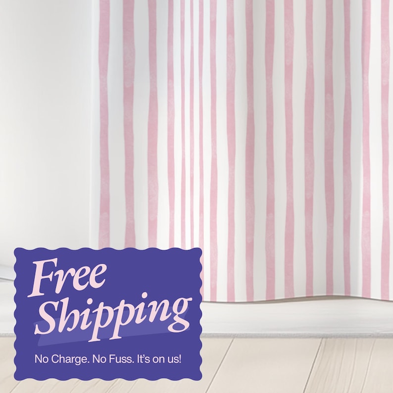 May include: A white shower curtain with vertical pink stripes. The stripes have a hand-painted look. The curtain is hanging in front of a white wall. A blue sign with the words "Free Shipping" is in the foreground.