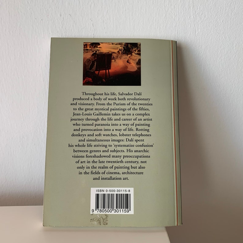May include: Book cover featuring a painting of a man painting a landscape. The book title is not visible. The back cover includes the author's name, Jean-Louis Gaillemin, and the book's ISBN number: 0-500-30115-8.