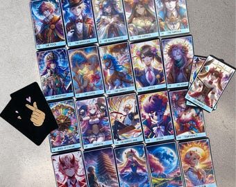 May include: A set of 22 tarot cards featuring colorful illustrations of people and symbols. The cards are arranged in a grid pattern on a light gray surface.