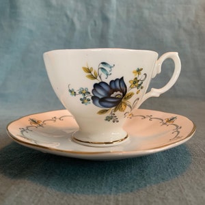 SHELTONIAN England: Blue and yellow flowers - Lady’s sized cup and saucer
