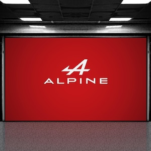 Puede incluir: Una puerta de garaje roja con el logotipo de Alpine en blanco. El logotipo es una A estilizada con un rayo.