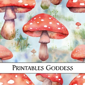 May include: Watercolor illustration of red and white mushrooms with white spots on a blue and green background. The text "PRINTABLES GODDESS" is at the bottom of the image.