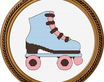 May include: A blue and pink roller skate with black wheels and a black strap. The skate is framed in a gold-colored frame.