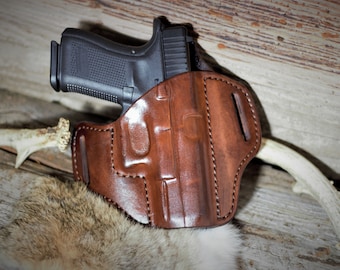 Fondine in pelle per Glock, Sig, Ruger, 1911, Smith & Wesson, Kimber, H&K. Fondina pancake, da portare all'esterno della cintura.