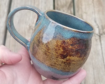 Blue and brown handmade coffee cup