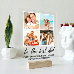 May include: A clear acrylic photo frame with a collage of four photos of a family. The frame has a wooden stand and a black inscription that reads "to the best dad. If you remember me, then I don't care if everyone else forgets."
