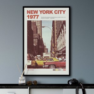 May include: A vintage poster with a photo of a yellow taxi cab driving down a street in New York City. The poster has the text "NEW YORK CITY 1977" at the top and "34TH STREET" at the bottom.