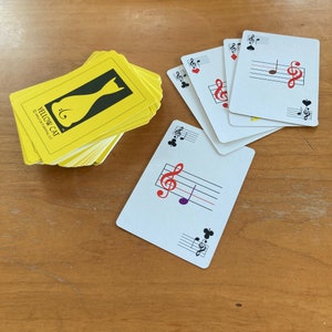 G Clef Music Note Jugando a las cartas