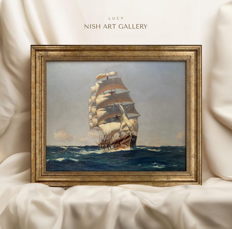 May include: A framed painting of a tall ship with white sails sailing on a blue ocean. The painting is in a gold frame with a decorative border. The title of the painting is "Lucy" and the artist is "Nish Art Gallery".