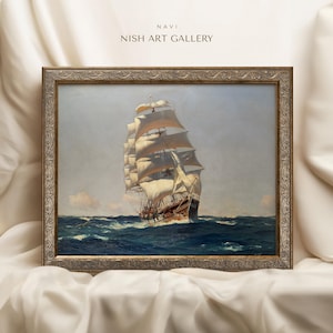 May include: A framed painting of a large sailing ship with white sails, navigating through a blue ocean. The ship is in the foreground of the painting, with the horizon and sky in the background. The painting is framed in a gold-colored frame with ornate details.