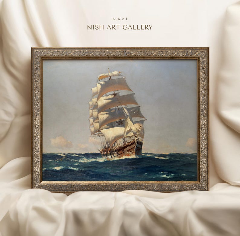 May include: A framed painting of a large sailing ship with white sails, navigating through a blue ocean. The ship is in the foreground of the painting, with the horizon and sky in the background. The painting is framed in a gold-colored frame with ornate details.