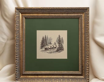 May include: A framed print featuring a winter scene with a horse-drawn sleigh and trees. The print is set against a dark green background within a gold-colored ornate frame. The text "EROS NISH ART GALLERY" is at the top.