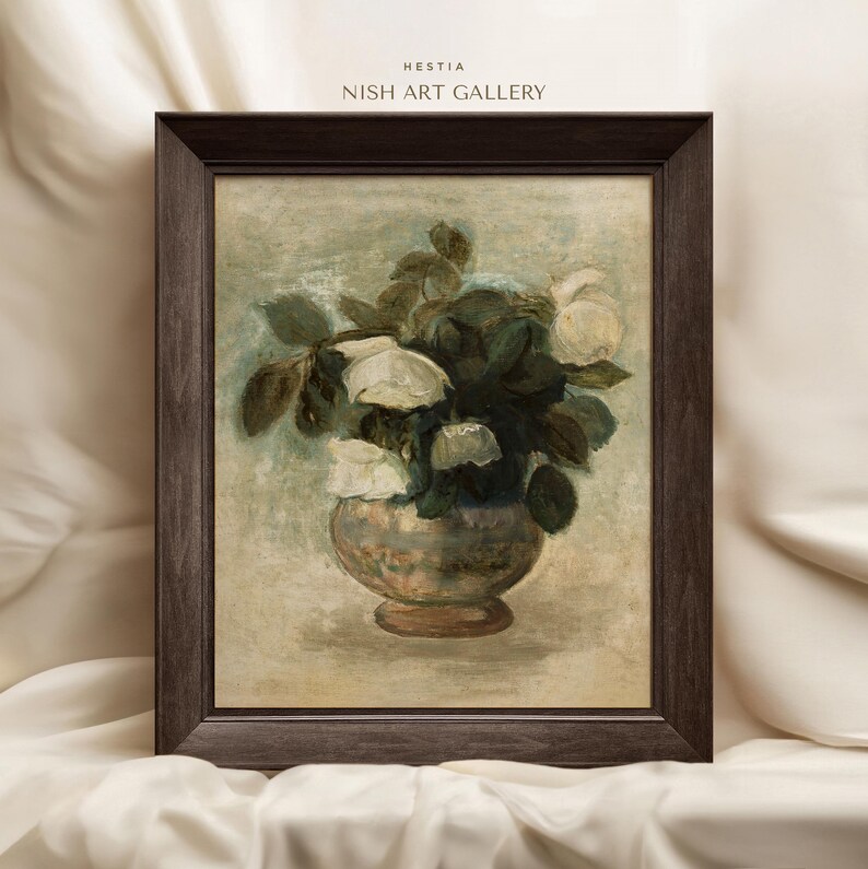 May include: A framed painting of a white flower bouquet in a vase. The flowers are arranged in a vase with a brown and white pattern. The painting is set against a light beige background.