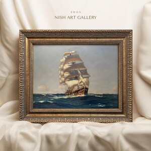 May include: A framed painting of a large sailing ship with white sails on a blue ocean. The frame is gold with ornate details. The painting is titled "EROS NISH ART GALLERY".