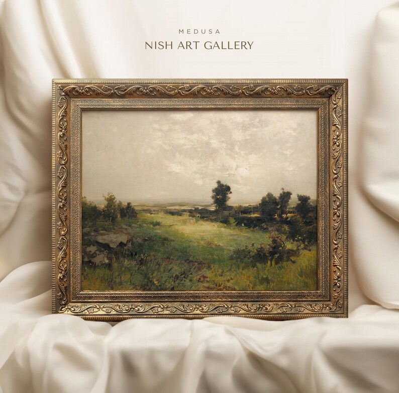 May include: A framed landscape painting depicting a rural scene with a grassy field, trees, and a cloudy sky. The painting is in a gold-coloured frame with ornate details. The title "MEDUSA NISH ART GALLERY" is written at the top of the image.