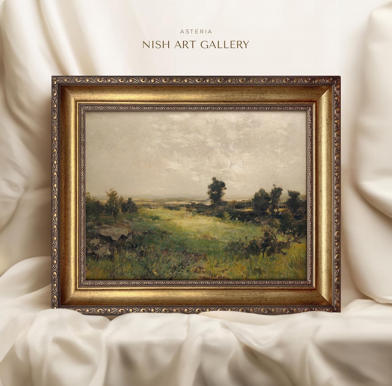 May include: A framed landscape painting depicting a rural scene with a field of green grass, trees, and a cloudy sky. The frame is gold with ornate detailing. The painting is titled "Asteria Nish Art Gallery".