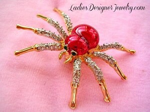 Lot - 14 KARAT YELLOW GOLD & ENAMEL SPIDER BROOCH