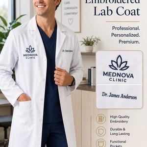 May include: A white lab coat featuring dark blue embroidery on the chest with the text Mednova Clinic and a lotus-style logo. The coat includes a notched lapel, front buttons, and pockets. The name Dr. James Anderson is embroidered in dark blue.