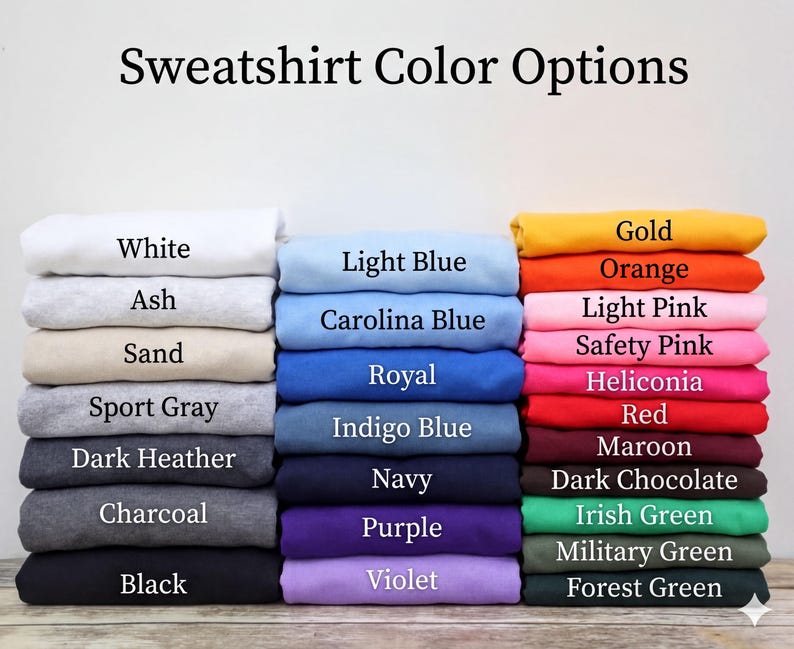 A collection of various colored t-shirts, each with a different color option, arranged in a grid-like pattern.